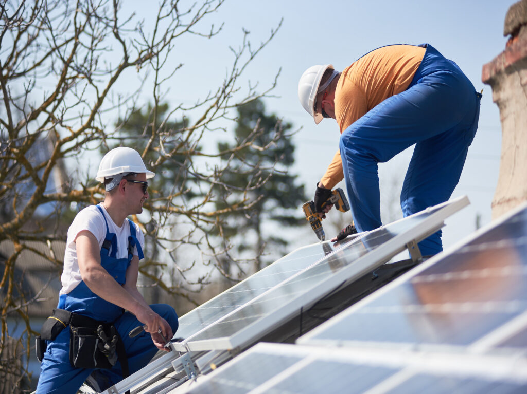 Installing Solar Photovoltaic Panel System On Roof Of House